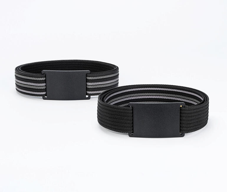 Twee cleverbelt Vario-wisselriemen in zwart en grijs op een tafel.