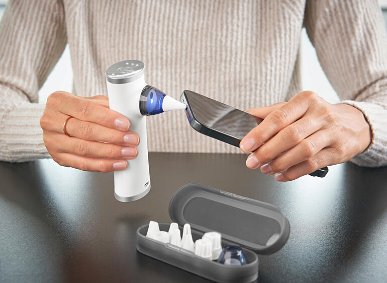 Mini-vacuümreiniger voor het reinigen van smartphones.
