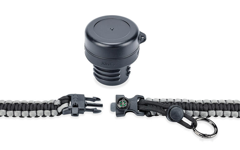 Dop en accessoires van een survival-drinkfles.