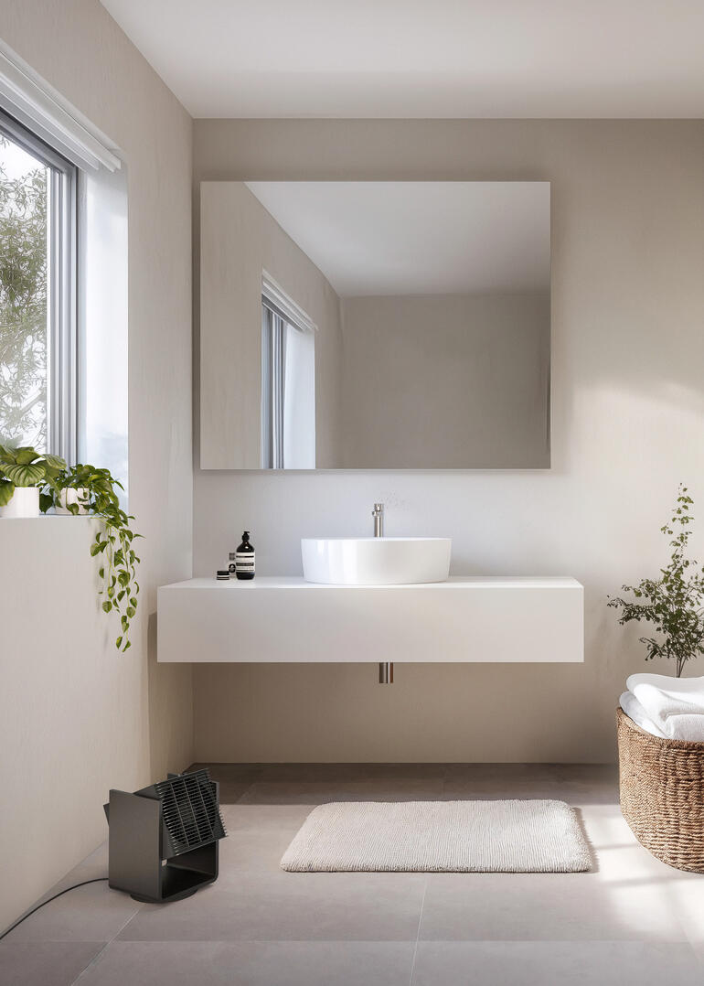 ALEX 2-in-1 verwarmings- en ventilator in de badkamer met wastafel.