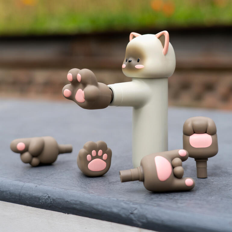 Mini-massageapparaat in de vorm van een konijn met verschillende massagetoestellen.