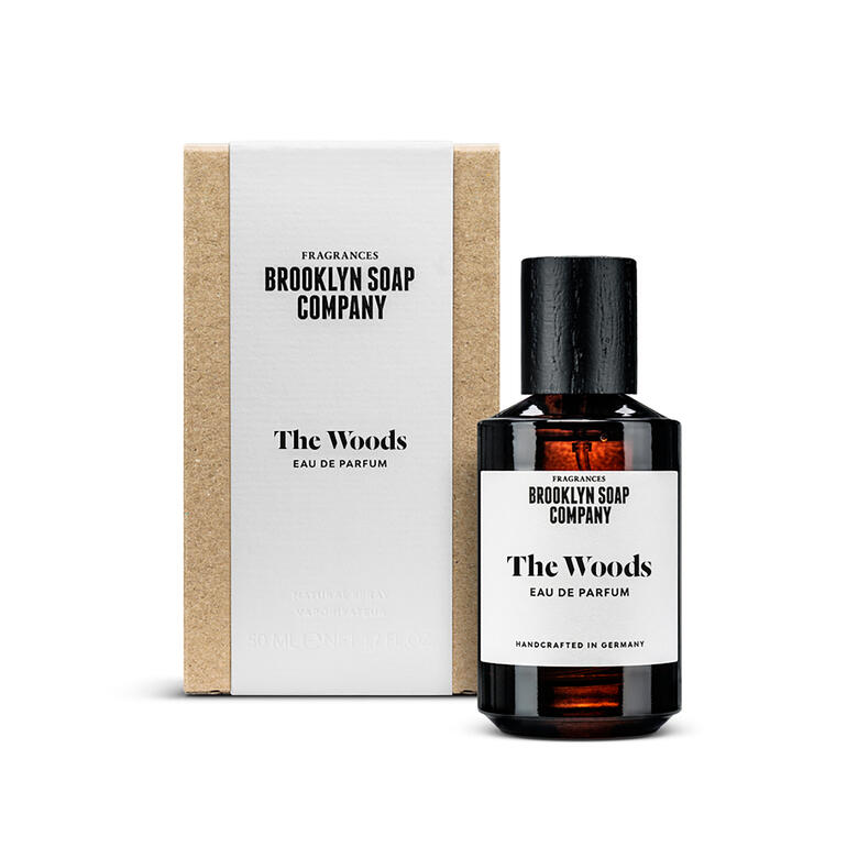 Fles van de geur 'The Woods' met een elegante verpakking.