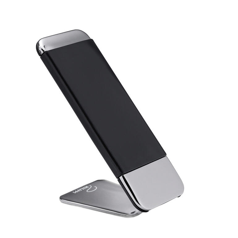 Zwarte grip telefoonhouder staande op een tafel.