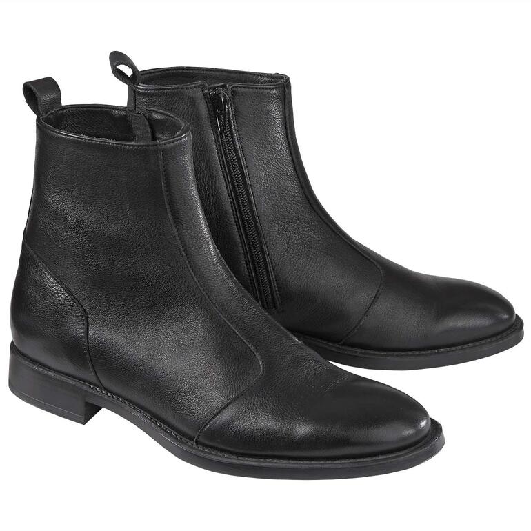 Twee zwarte leren Dandy-boots naast elkaar, van voren