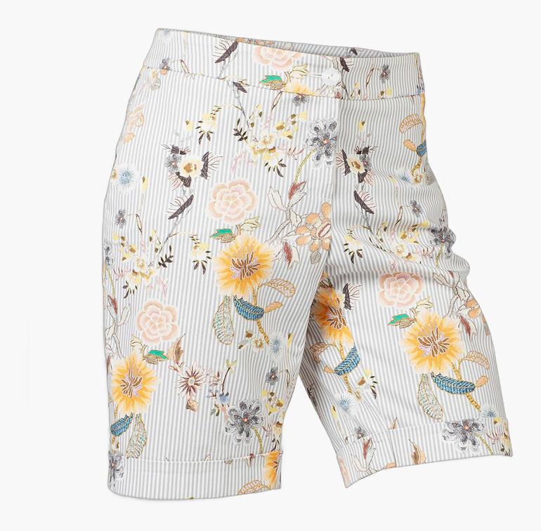 Elegante bermuda shorts met bloemenpatroon in pastelkleuren.