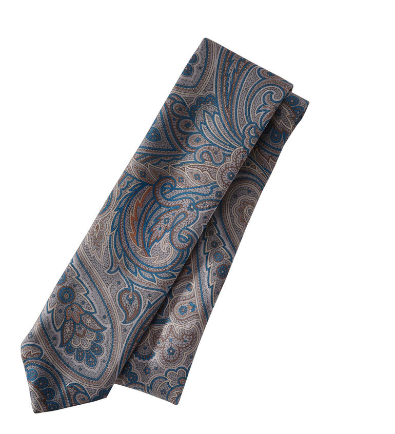Paisley-stropdas in gedempte kleuren op een witte achtergrond, elegant gedrapeerd.