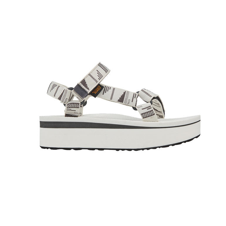 Teva® plateausandalen Zijaanzicht van de Teva® plateau-sandaal in wit.