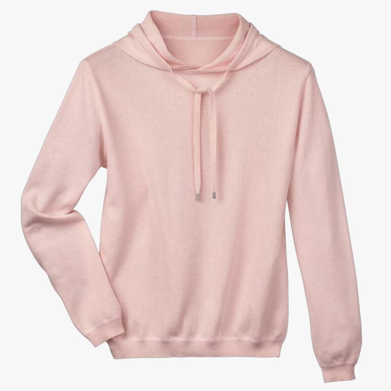 Roze katoen-kashmir hoodie op een witte achtergrond.