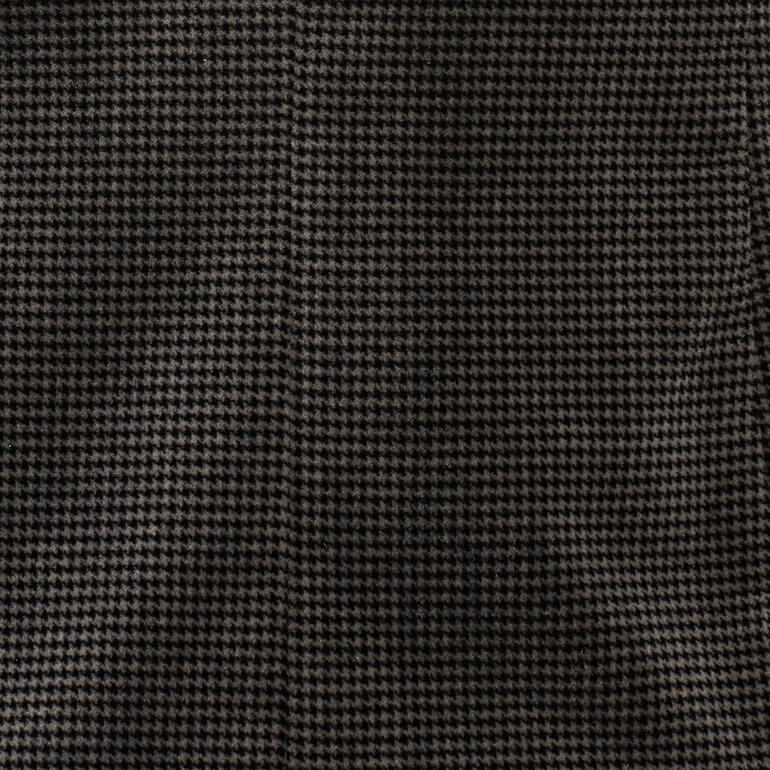 Houndstooth patroon op een fluwelen blazer stof