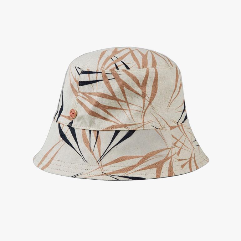 Omkeerbare bucket hat met plantenmotief op een witte achtergrond.