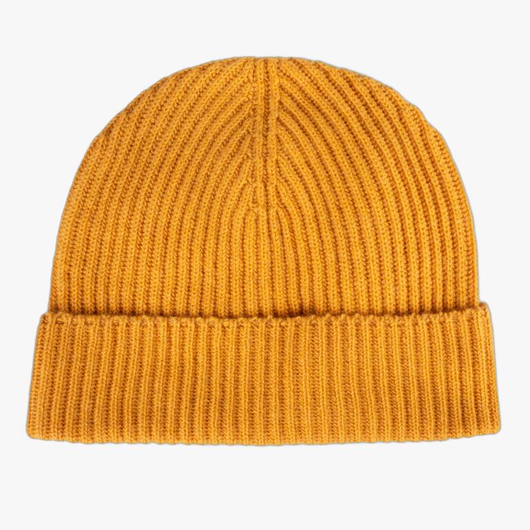Mosterdkleurige kasjmier vissersmuts van fijn materiaal.