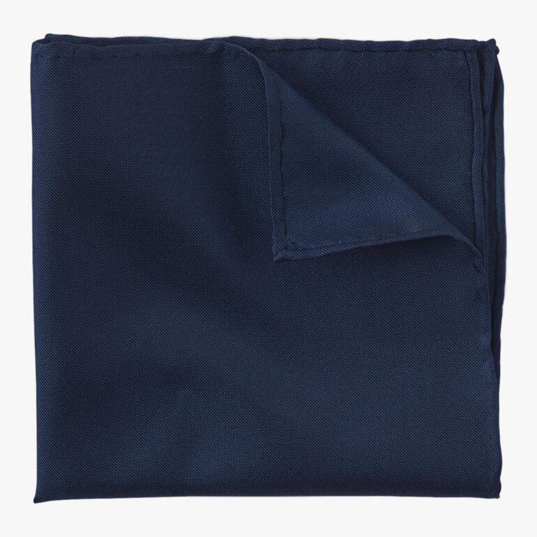 Donkerblauw Oxford zijden pochet gevouwen.