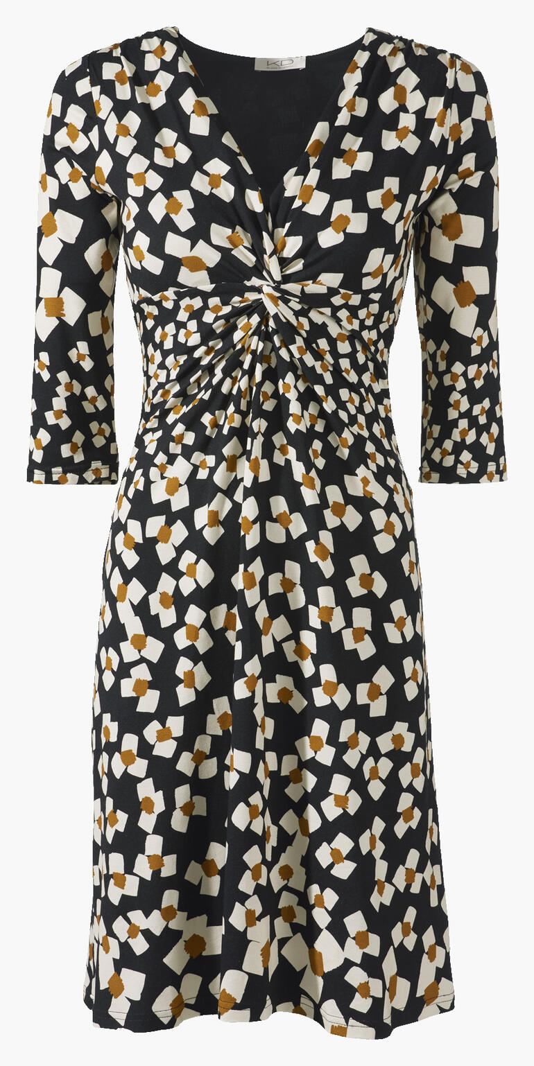 Vooraanzicht van een zwart-witte jersey jurk met abstracte bloemen en een elastische taille.