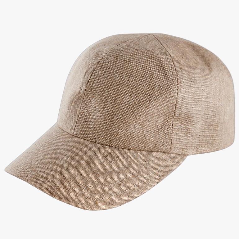 Licht kleurige basecap van stof, close-up.