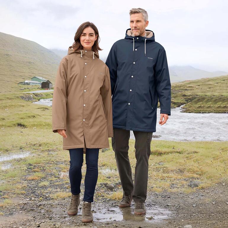 Tretorn regenjas in beige op een witte achtergrond.