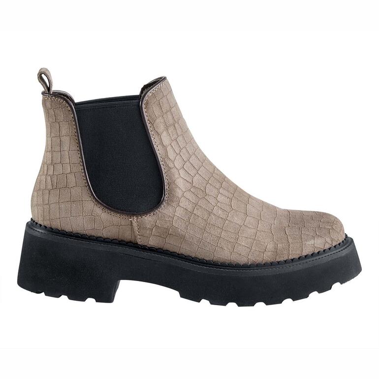 Zijaanzicht van beige chelsea-boots met structuur.