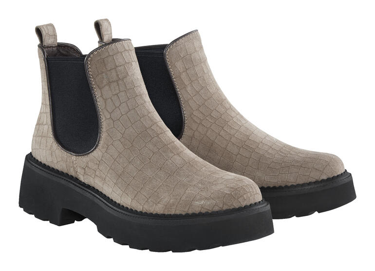 Twee beige chelsea-botsen naast elkaar, met gestructureerd oppervlak.