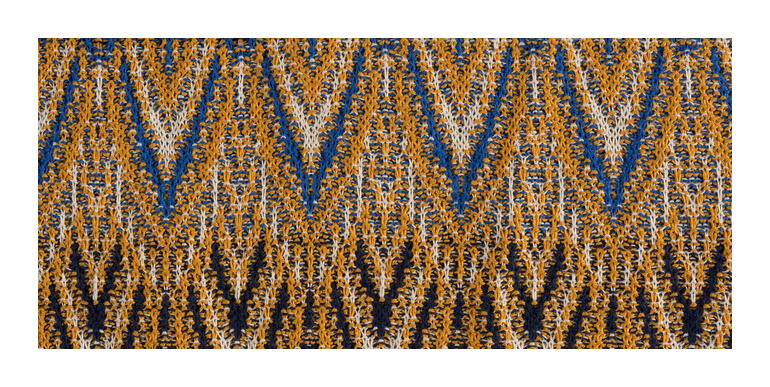 Jacquard-patroon in aardetinten met geometrisch design.