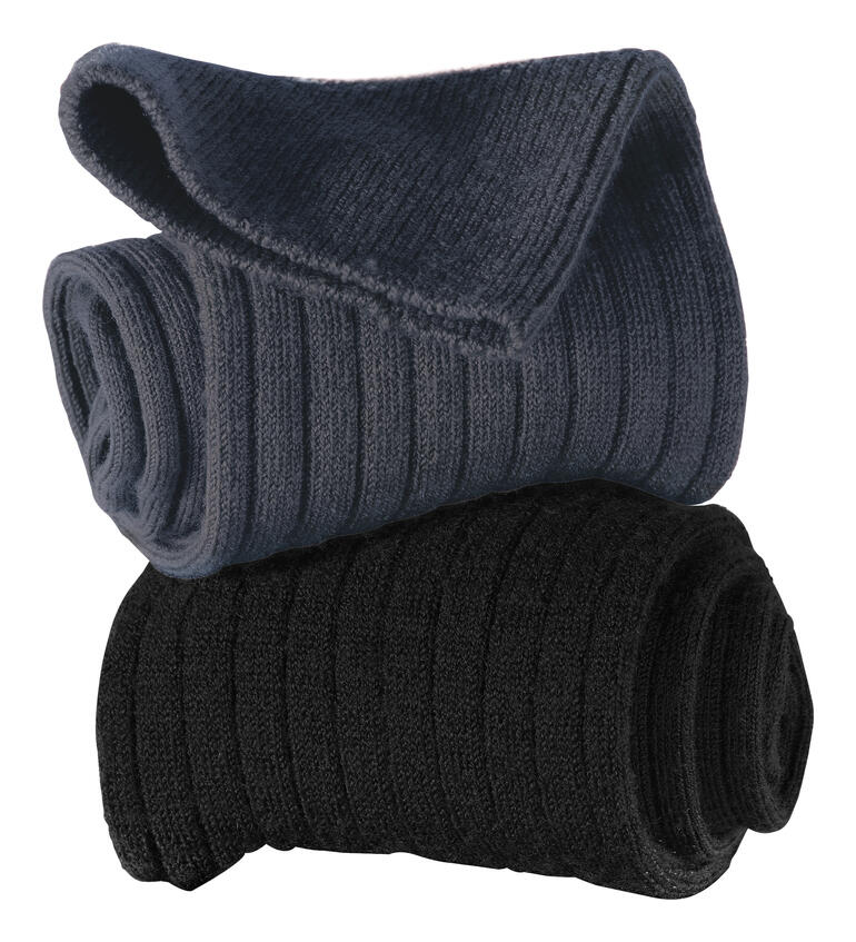 Twee rollen merino-compressiekousen in donkergrijs en zwart.