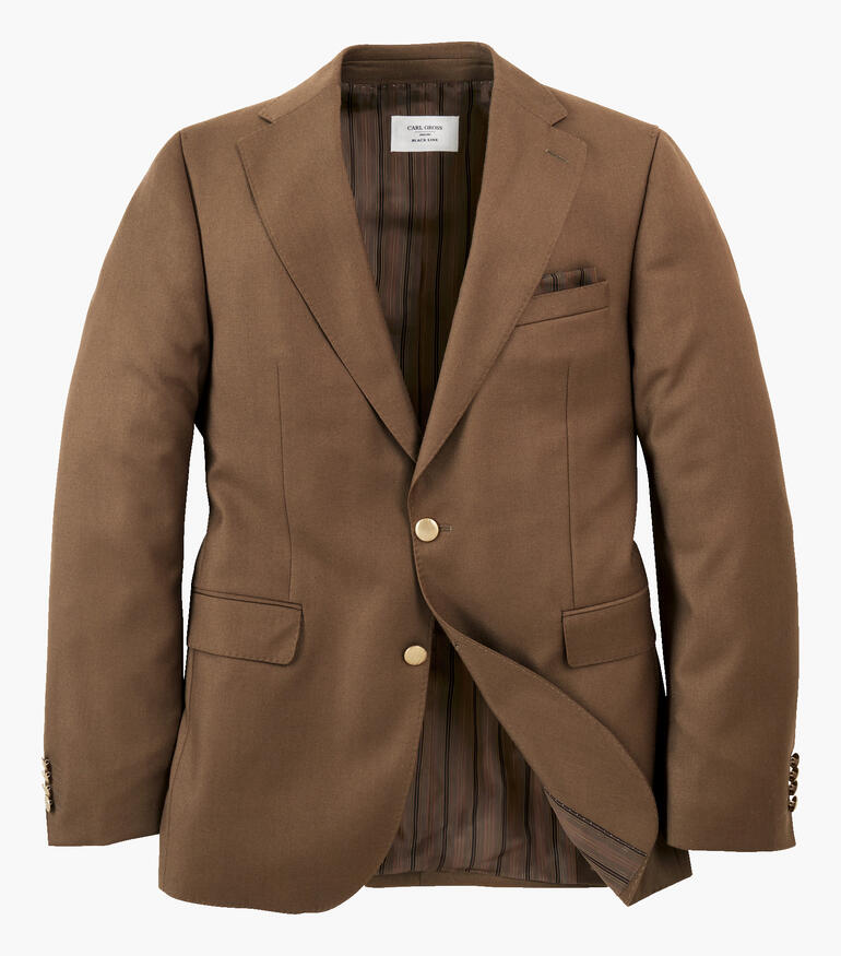 Open bruine blazer op een witte achtergrond met de binnenkant zichtbaar.