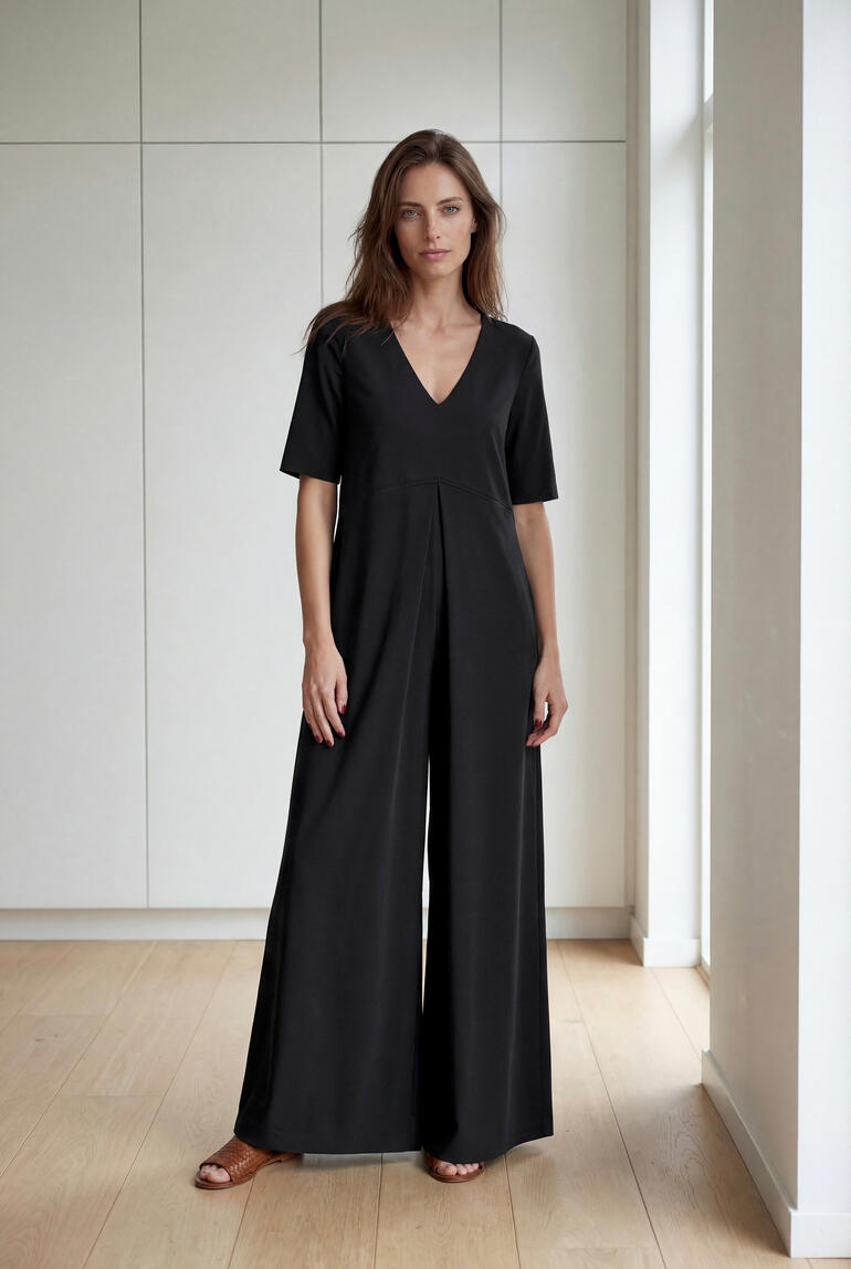 Zwart jersey jumpsuit met V-hals en wijde pijpen