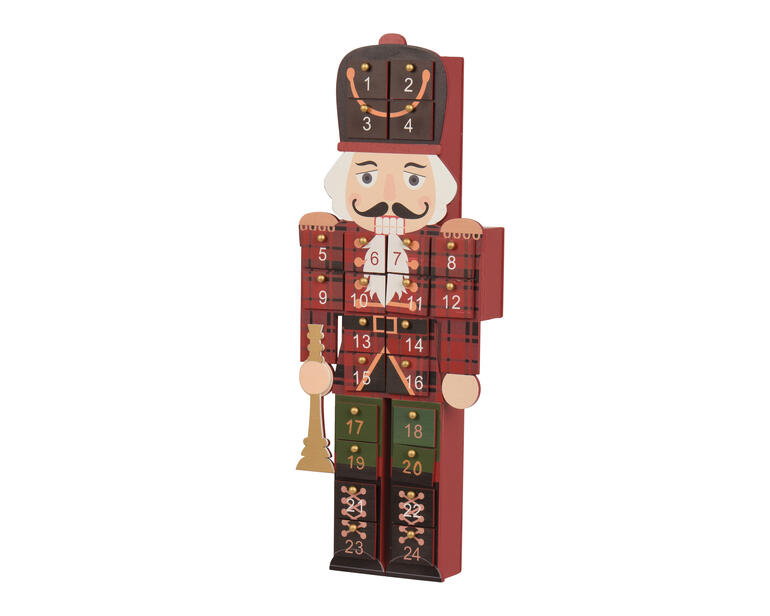 Adventskalender notenkraker met zichtbare deurtjes en kerstversiering.