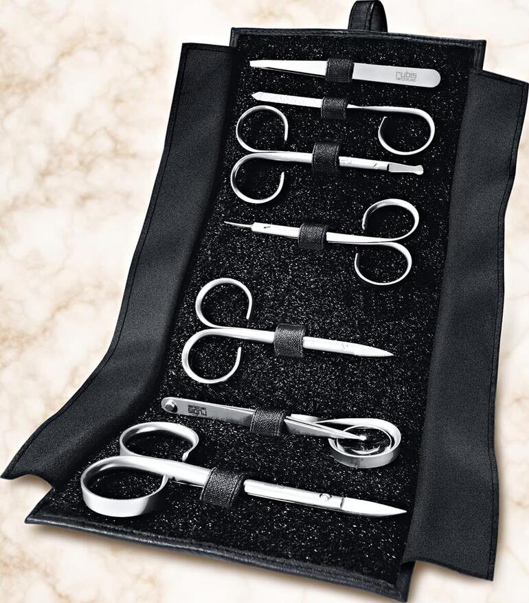 Zeven-delig manicure set in zwarte etui.